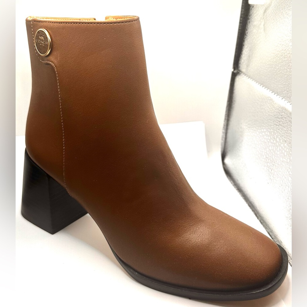 Coach Shana Bootie in Color Saddle 
SOLD OUT in Size 6. LIKE NEW.